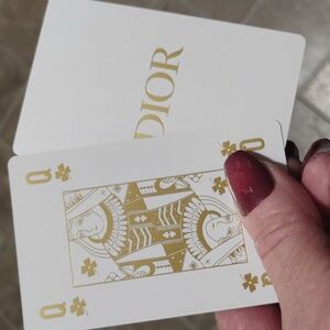 Dior Queen of clovers collectors playing card from BEE Deck in a magnetic case